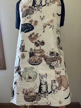 Load image into Gallery viewer, Cats - On Blanket; With Hibiscus and Lilies; With Yarn; Laurel Burch Jungle Songs and Fantastic Felines- Adult and Child Aprons