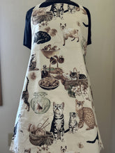 Load image into Gallery viewer, Cats -  On Blanket; With Hibiscus and Lilies; With Yarn; Laurel Burch Jungle Songs and Fantastic Felines- Adult and Child Aprons
