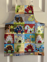 Load image into Gallery viewer, Cartoonish Dinosaurs in Squares - Child and Tiny Aprons

